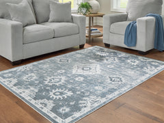 3 Brothers Decor - Ashley Furniture - Avanworths Rug - Washable 5'3" x 7' Area Rug / Blue/Gray/Ivory - R407792