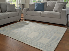 3 Brothers Decor - Ashley Furniture - Dylanton Rug - 5' x 7' Area Rug / Ivory/Blue - R407812