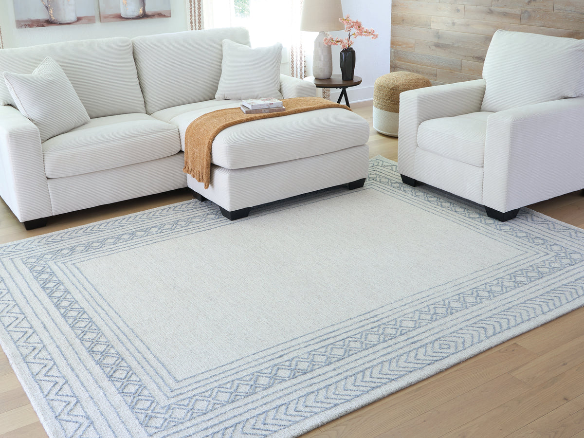 3 Brothers Decor - Ashley Furniture - Azelhurst Rug - 7'8" x 10' Area Rug / Blue/Ivory/Gray - R407851