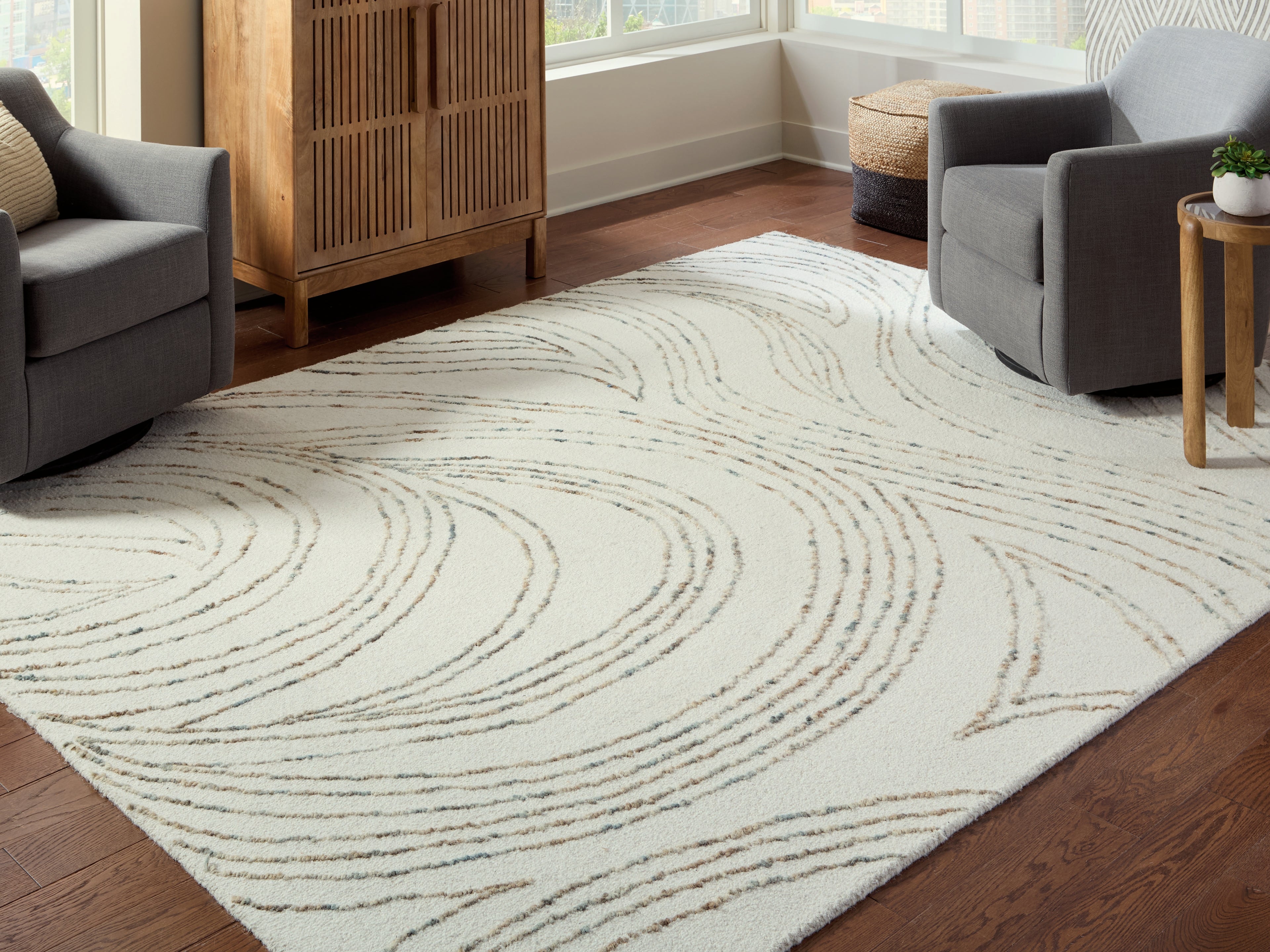 3 Brothers Decor - Ashley Furniture - Deenbury Rug - 7'8" x 10' Area Rug / Ivory/Green/Brown - R407861