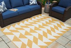 3 Brothers Decor - Ashley Furniture - Thomley Rug - 5' x 7' Rug / Ivory/Yellow - R900062