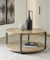 3 Brothers Decor - Ashley Furniture - Dyonton Coffee Table - Round Cocktail Table / Light Grayish Brown - T574-8