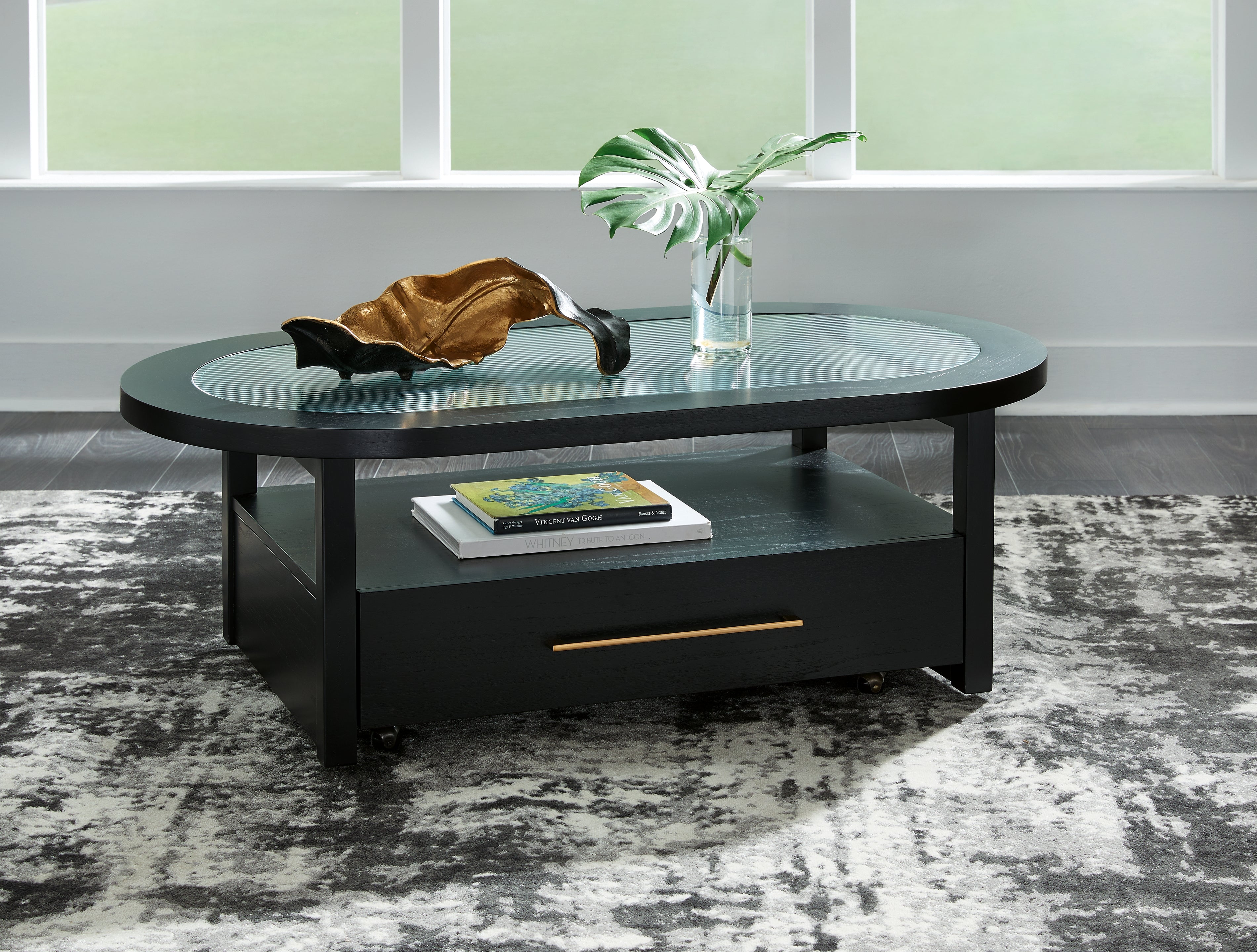 3 Brothers Decor - Ashley Furniture - Winbardi Coffee Table - Oval Cocktail Table / Black - T786-0