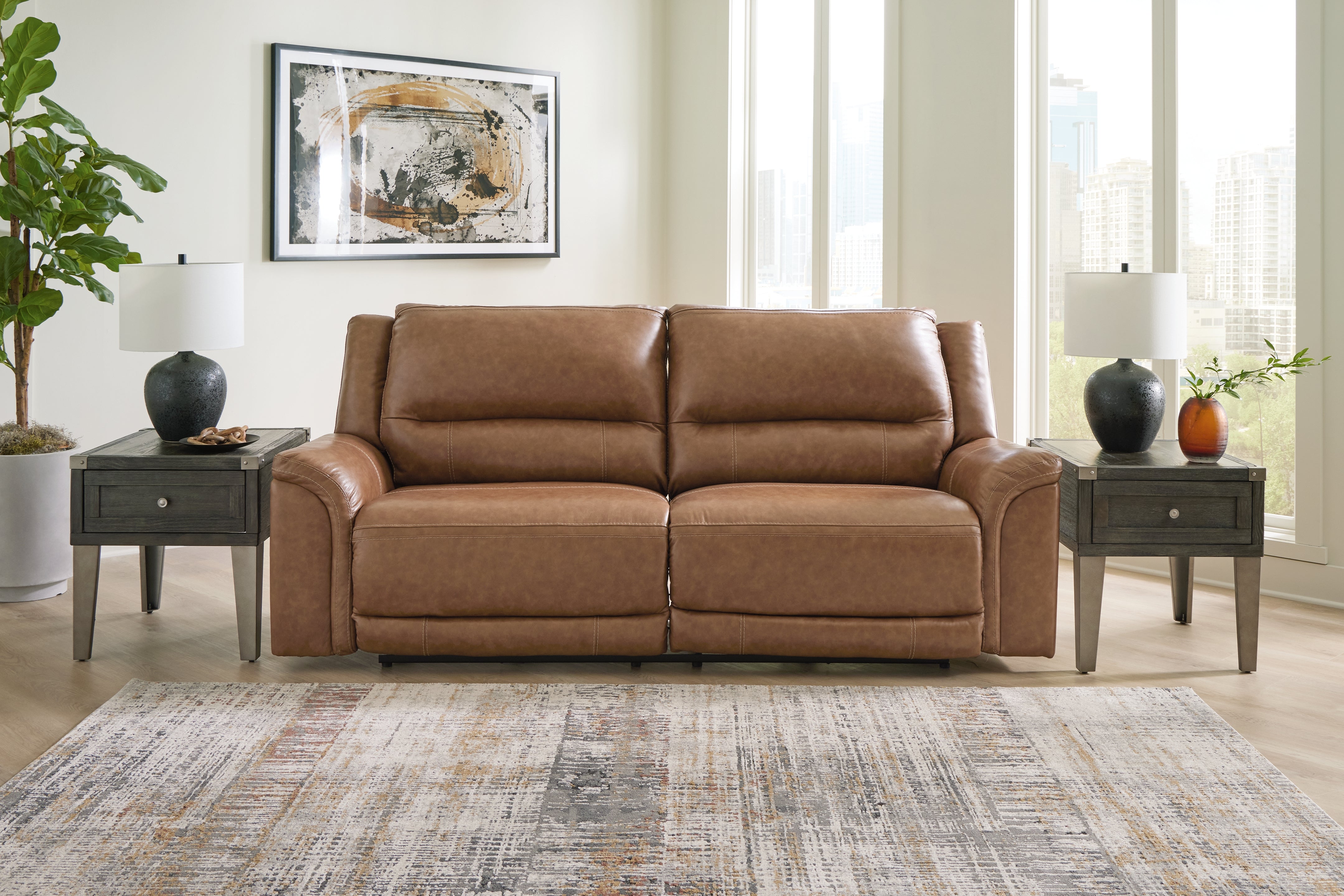 3 Brothers Decor - Ashley Furniture - Trasimeno Living Room - 2 Seat PWR REC Sofa ADJ HDREST / Caramel - U8281547