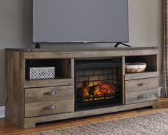 3 Brothers Decor - Ashley Furniture - Trinell 63" TV Stand with Electric Fireplace - 63" TV Stand with Electric Fireplace / Brown - W446W9