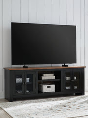 3 Brothers Decor - Ashley Furniture - Wildenauer 76" TV Stand - 76" / Brown/Black - W664-68