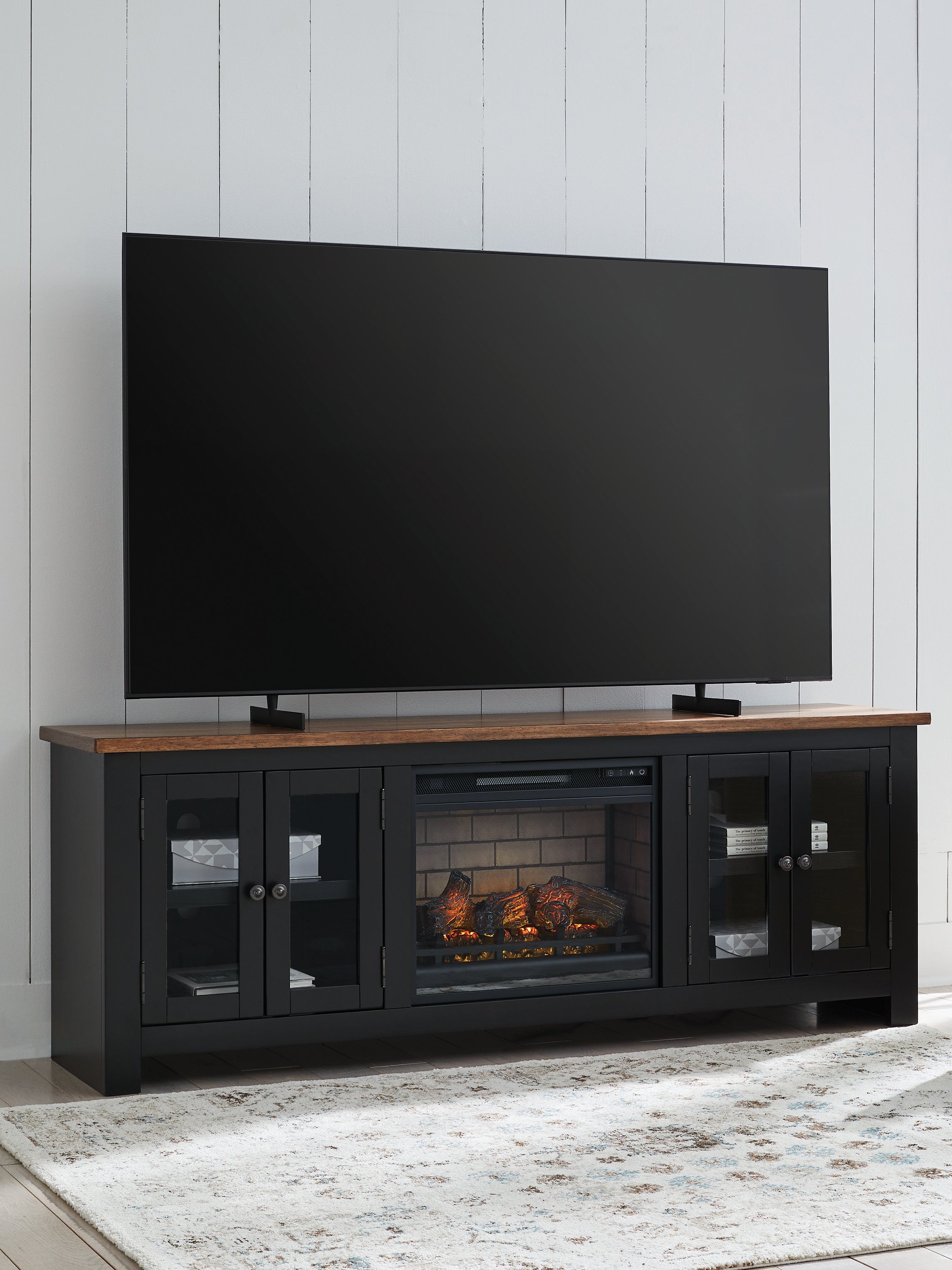 3 Brothers Decor - Ashley Furniture - Wildenauer 76" TV Stand with Electric Fireplace - 76" TV Stand with Electric Fireplace / Brown/Black - W664W1