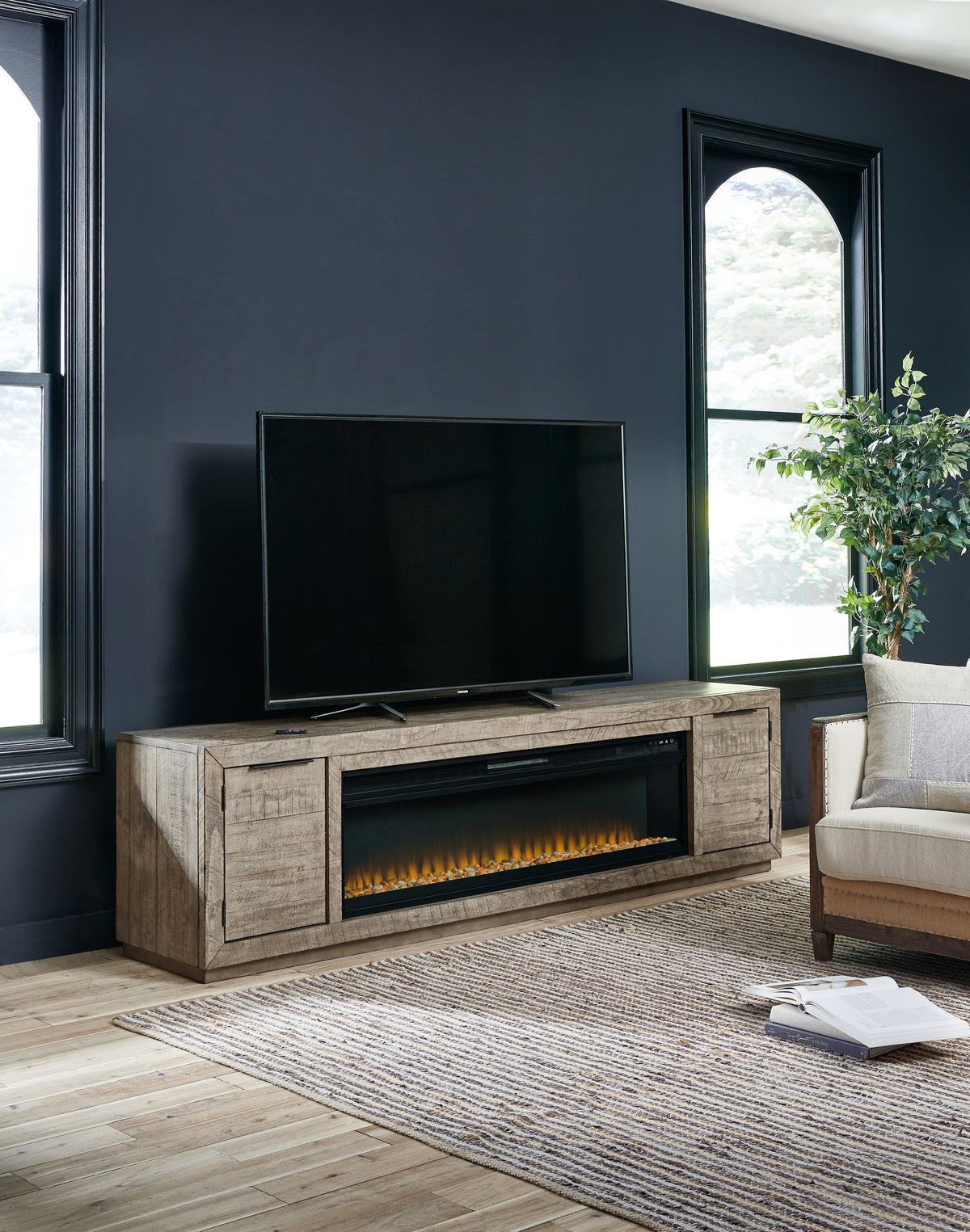 3 Brothers Decor - Ashley Furniture - Krystanza TV Stand with Electric Fireplace - TV Stand with Electric Fireplace / Weathered Gray - W760W1