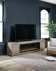 3 Brothers Decor - Ashley Furniture - Krystanza TV Stand with Electric Fireplace - TV Stand with Electric Fireplace / Weathered Gray - W760W1